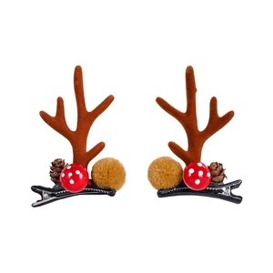 Christmas reindeer antler hair clips with pine cones and mushrooms on white background