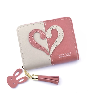 Women's short bi-color zip wallet with heart patch and rabbit tassel in pink and beige