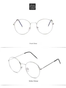 Detail view of round silver metal frame glasses with black temple tips on white background