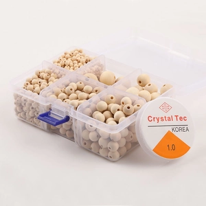 Natural wood beads set in a clear organizer box for DIY jewelry making crafts