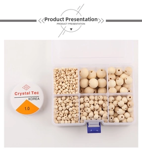 Macro detail of natural wooden beads kit in a clear 6-grid box with 1mm elastic string