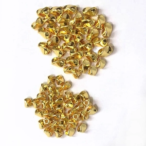 Detailed view of 14K gold plated triangular twisted spacer beads for DIY jewelry making