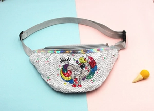 Detail of sequin kids fanny pack featuring a colorful unicorn print and magic text