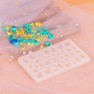 DIY silicone mold for geometric resin jewelry featuring heart, moon, and star shapes