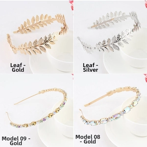 Detail view of gold and silver leaf headbands and rhinestone hair accessories