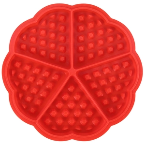 Red flower shaped silicone waffle mold with 5 petal sections and grid texture on white background