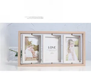 Close-up of a Nordic triple 4x6 inch rotating wooden photo frame in light wood finish