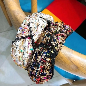 Cerchietti larghi in tweed con nodo decorativo e fili dorati luccicanti