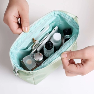 Waterproof light green makeup bag with multi-compartments for travel organization