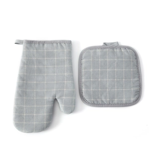 Thick heat resistant grey oven mitt and pot holder set with minimalist white grid pattern