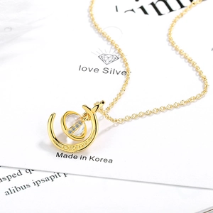Elegant gold celestial planet pendant necklace with zircon crescent and rotating bead