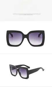 Détails de lunettes de soleil carrées noires avec des verres dégradés gris