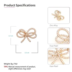 Elegant bow-shaped earrings with white imitation pearls and sparkling rhinestones