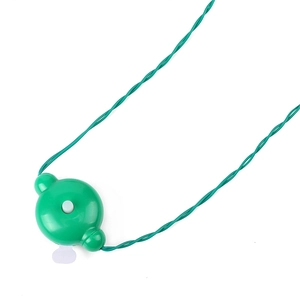 Detail of green LED controller with battery pull-tab and wiring for Christmas necklace