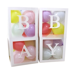 Detailed view of four white transparent boxes with BABY letters and colorful balloons