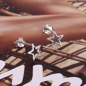 Elegant S925 sterling silver hollow star stud earrings for women with high polish finish