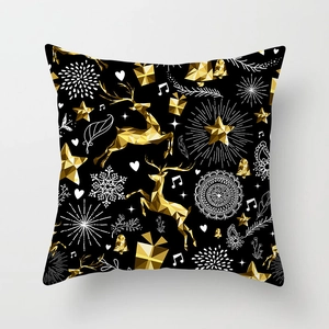 Housse de coussin noire et dorée élégante avec motifs géométriques d'élan et de flocons