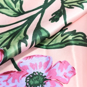 Pink satin square scarf featuring morning glory floral print and smooth silk texture