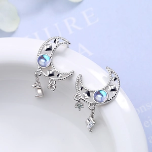 Elegant hollow moon tassel earrings with blue glowing beads and dangling zircons