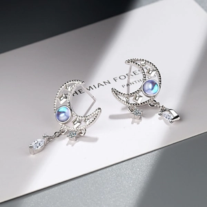 Silver hollow moon tassel earrings with iridescent stones and zircon accents