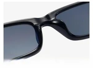 Macro view of integrated nose pads on black square sunglasses for comfortable fit