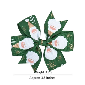 3.5-inch forest green Christmas bow hair clip with Santa Claus and snowflake prints
