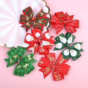 Christmas grosgrain ribbon hair bows set featuring Santa Claus and reindeer motifs