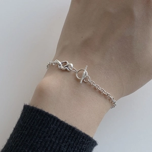 S925 sterling silver minimalist heart chain bracelet with OT toggle clasp on wrist