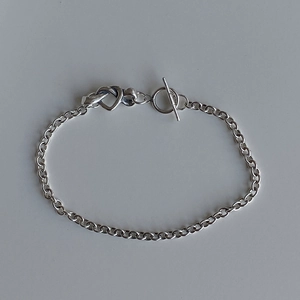 925 sterling silver chain bracelet featuring a heart knot and vintage OT toggle clasp