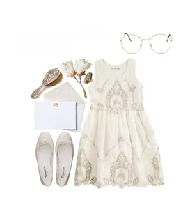 Chic lifestyle set with gold round metal glasses and beige floral lace dress