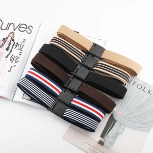 Set of 6 elastic waist belts in assorted patterns on a fashion magazine background