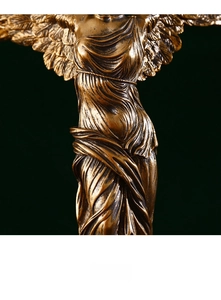 Close-up of intricate feather wings and flowing robe textures on resin bronze statue
