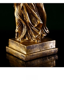 Detailed view of the classical resin statue's base with vintage bronze finish textures