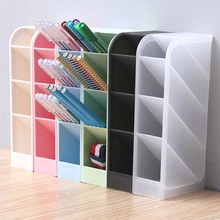 Close-up of multi-color 4-slot tilted plastic desk organizers for stationery and makeup