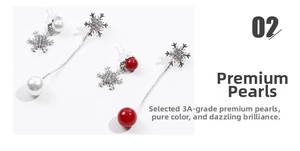 Close-up of snowflake earrings featuring white and red pearls with shimmering crystals