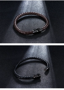 Detail of woven leather bracelet with black magnetic clasp in brown and black colors