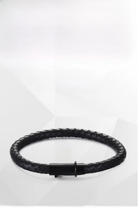 Detail of woven black microfiber leather bracelet with black titanium steel magnetic clasp