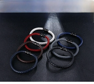Macro shot of minimalist braided microfiber leather bracelets with black magnetic clasps