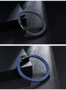 Detail showing blue microfiber braided leather texture and black magnetic clasp