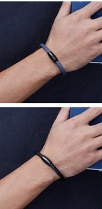 Detail of woven leather bracelets in black and blue with secure magnetic metal clasps