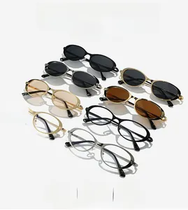 Detailed collection of oval glasses frames in assorted colors including gold and tortoise