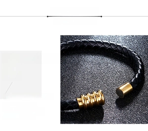 Detail of 316L stainless steel magnetic clasp on black braided leather bracelet