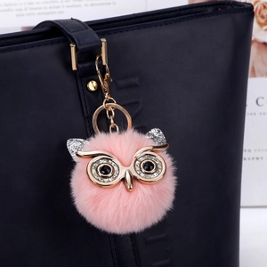 Pink owl faux rabbit fur pom pom keychain with glitter eyes and rhinestone details