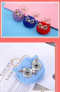 Close-up of glitter owl plush pompom keychains in purple, blue, red and light blue colors