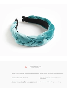 Close-up of a blue velvet braided headband showing plush texture and daily care guide