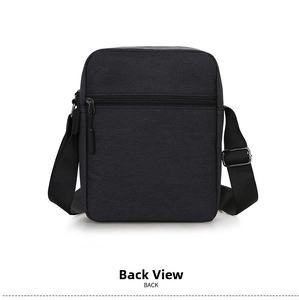 Detail showing the back of the Oxford fabric messenger bag with a horizontal zipper pocket