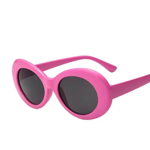 Fashionable retro oval rose pink sunglasses for women with dark lenses for Y2K styling