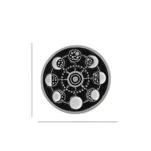 Detailed view of solar system moon phase enamel pin with 2.2cm diameter measurement