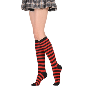 Close-up of red and black striped knee-high socks showing knit texture and stretch fit
