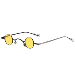 Retro steampunk round sunglasses with yellow lenses and slim dark grey metal frames